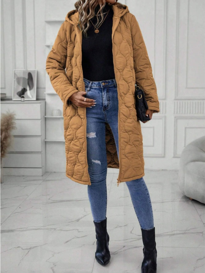 Veste matelassée à capuche pour femmes avec fermeture éclair unie