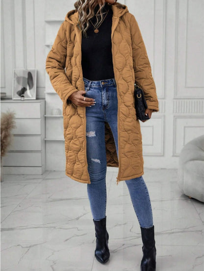 Veste matelassée à capuche pour femmes avec fermeture éclair unie